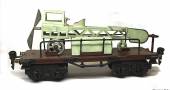 18810 - Märklin, Flugzeugtransportwagen, Plattformwagen mit hellgrünem Flugzeug Ladung, alte Spur 0