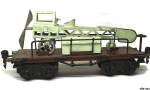 18810 - Märklin, Flugzeugtransportwagen, Plattformwagen mit hellgrünem Flugzeug Ladung, alte Spur 0 18810 - Märklin, Flugzeugtransportwagen, Plattformwagen mit hellgrünem Flugzeug Ladung, alte Spur 0